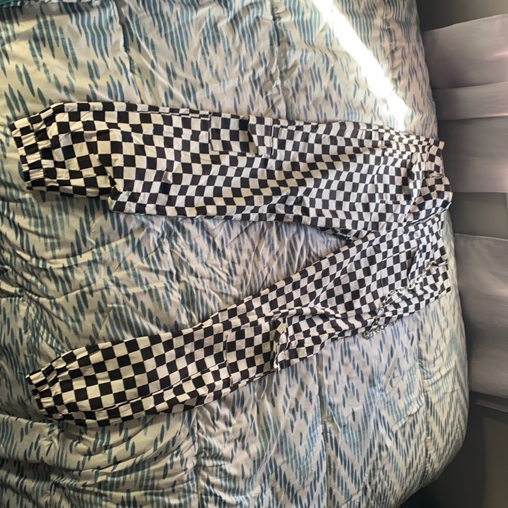 Checkerboard pants with chain. Never worn